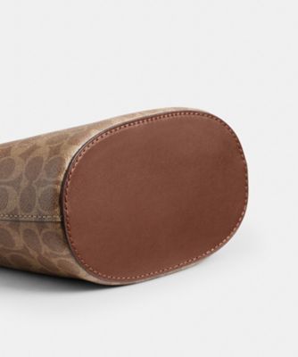ブリーカー バケット バッグ 21・シグネチャー キャンバス | COACH